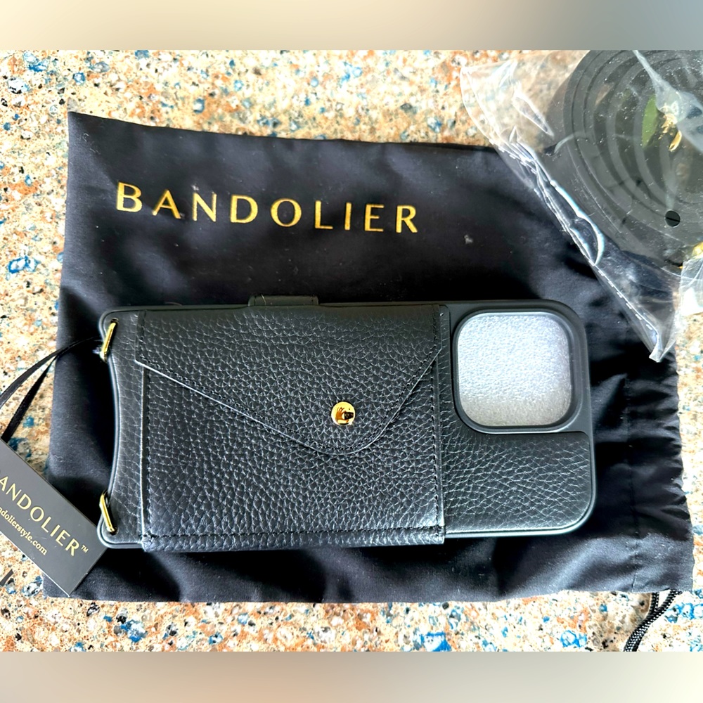 iPhone 14 pro max Bandolier case with strap.